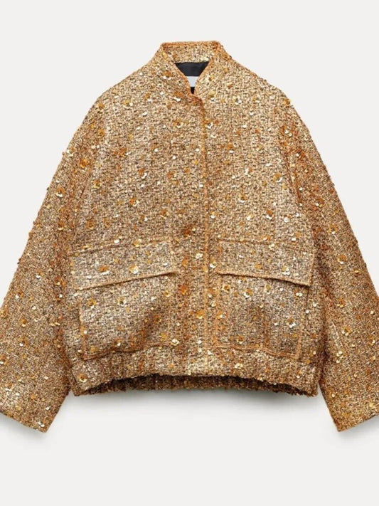 Goldene Tweed-Bomberjacke mit Pailletten, zwei großen Fronttaschen und Reißverschluss. Modische Damenjacke, ideal für Herbst- und Winteroutfits.