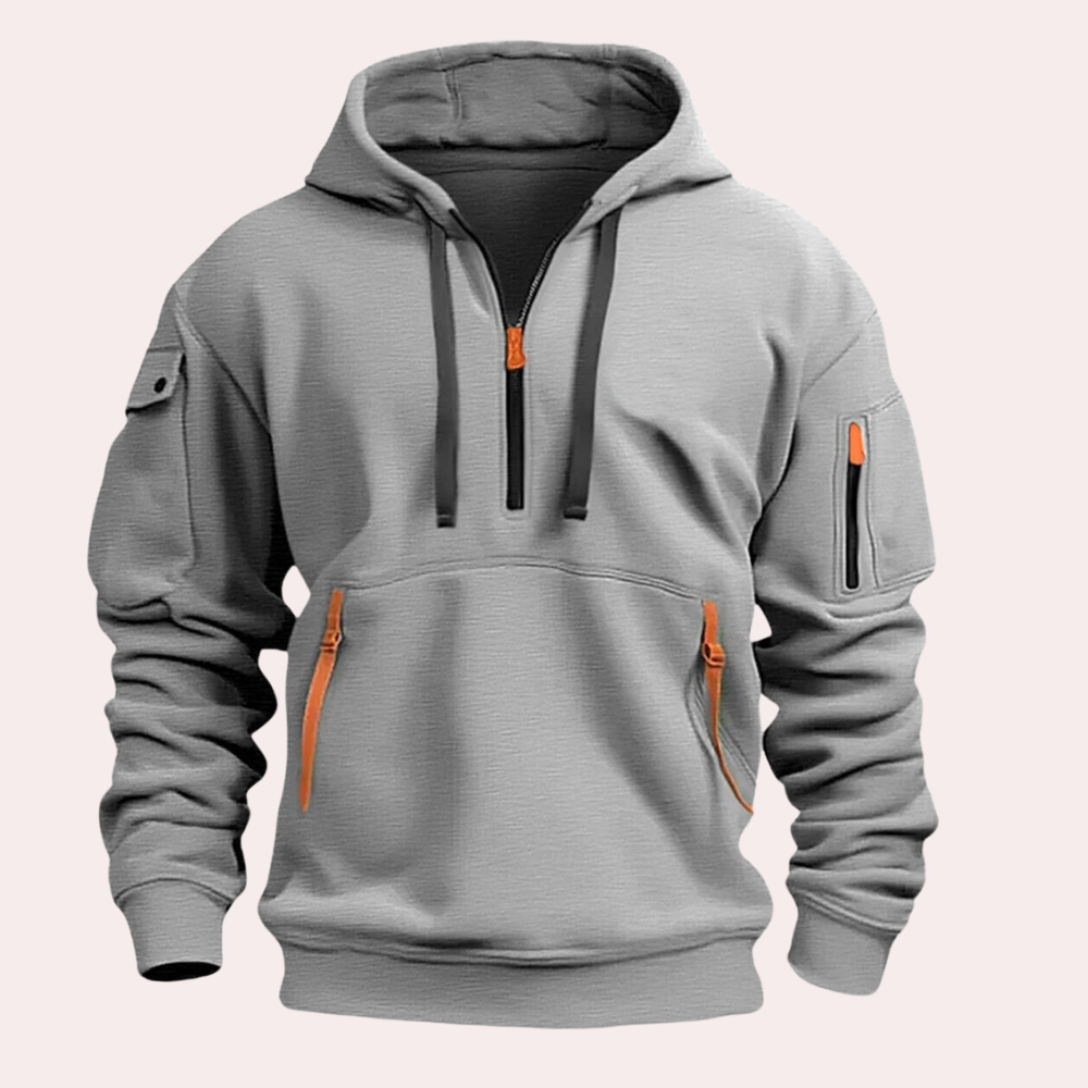 Grauer Hoodie mit Kapuze, Reißverschlüssen und Taschen, sportliches Design, ideal für Freizeit und Outdoor-Aktivitäten.