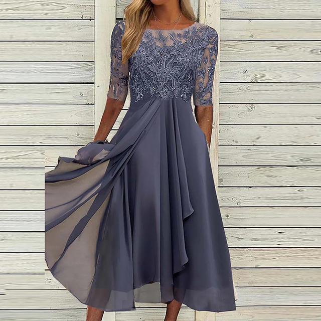 Elegantes graues Abendkleid mit Spitzenoberteil und fließendem Chiffonrock, ideal für formelle Anlässe. Damenmode, festliches Kleid, Spitzenkleid.