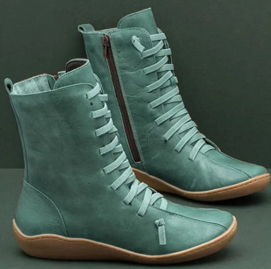 Grüne Damenstiefel aus Leder mit Schnürung und seitlichem Reißverschluss, flache Sohle, modisch, bequem, ideal für Herbst und Winter.