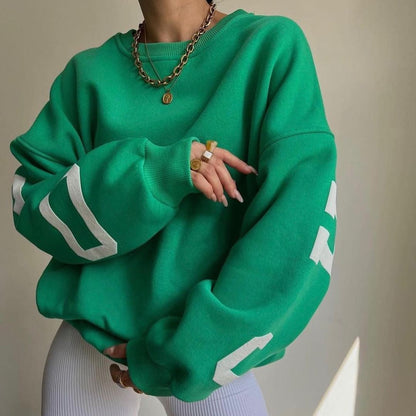 Women's top with print, round neckline, and long sleeves, loose fit