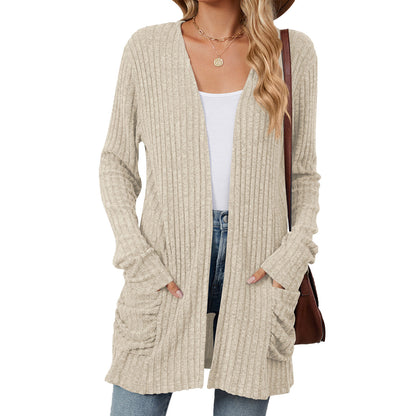 Women's knitted jacket with long sleeves, plain, with pockets