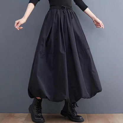 Women's solid color A-line skirt with layered design