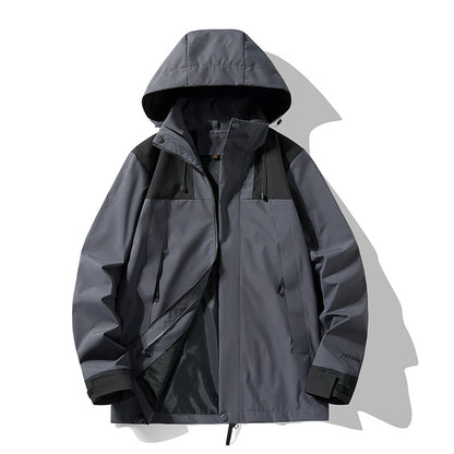 Graue Outdoor-Jacke mit Kapuze, wasserdicht und winddicht, ideal für Herren. Funktionale Taschen, Reißverschluss, atmungsaktives Material. Perfekt für Wandern.
