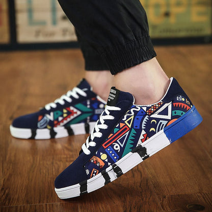 Men's sailing shoes made of canvas with lacing, rubber sole, and low shaft