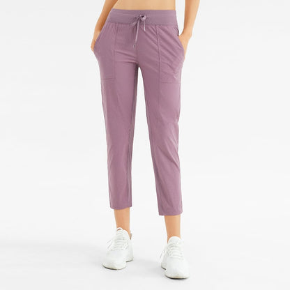Damen-Yogahose mit knöchellangem Schnitt, Taschen und mittelhohem Bund – Sportlicher Stil