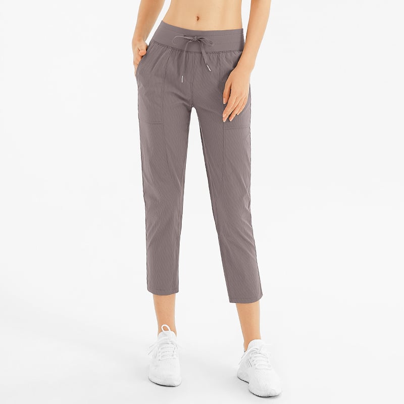 Damen-Yogahose mit knöchellangem Schnitt, Taschen und mittelhohem Bund – Sportlicher Stil