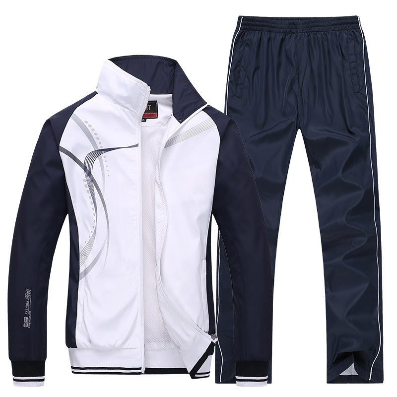 Zweiteiliger Trainingsanzug für Herren, bestehend aus weißer Jacke mit schwarzen Ärmeln und blauer Hose. Sportbekleidung, Freizeitmode, Herrenanzug.