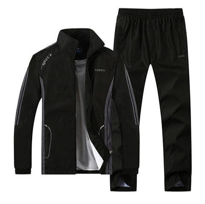 Schwarzer Herren-Trainingsanzug mit Jacke und Hose, sportlich, atmungsaktiv, ideal für Fitness und Freizeit, modisches Design, Reißverschlusstaschen.