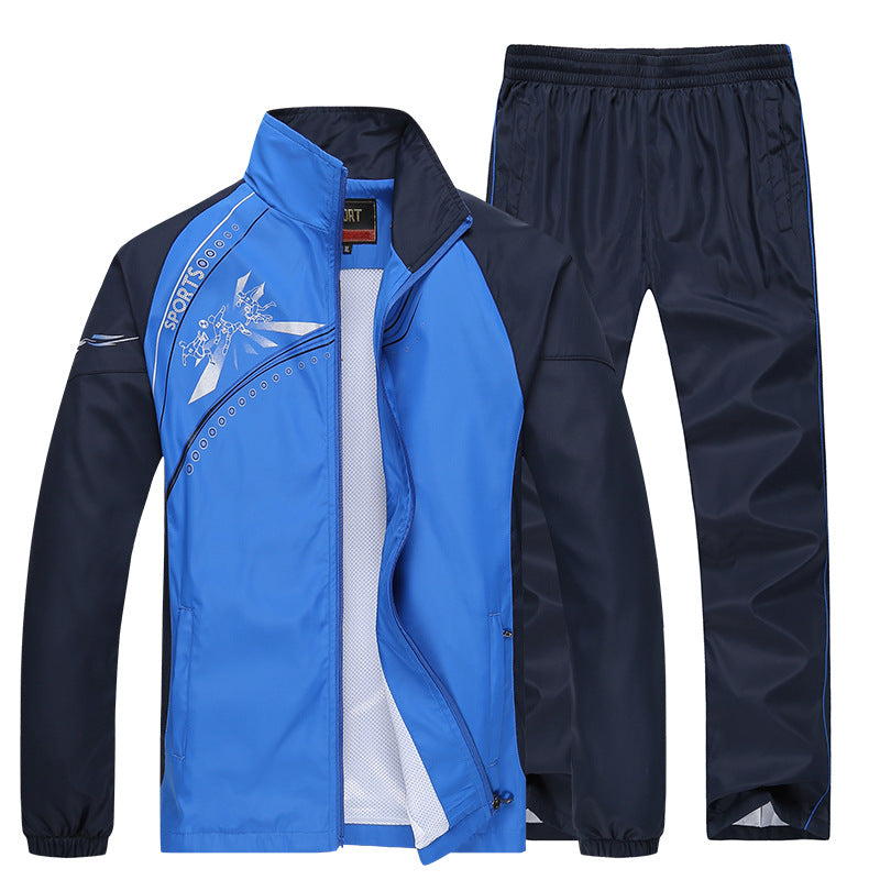 Blauer Sportanzug für Herren, bestehend aus Jacke und Hose, ideal für Outdoor-Aktivitäten. Atmungsaktives Material, modernes Design.