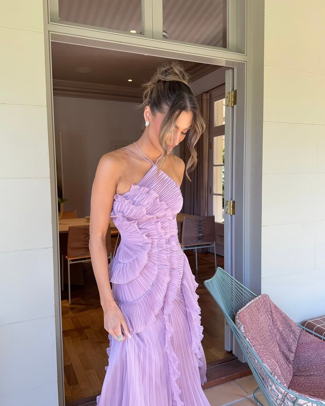 Women's summer dress with open back, tie belt, and flounced hem