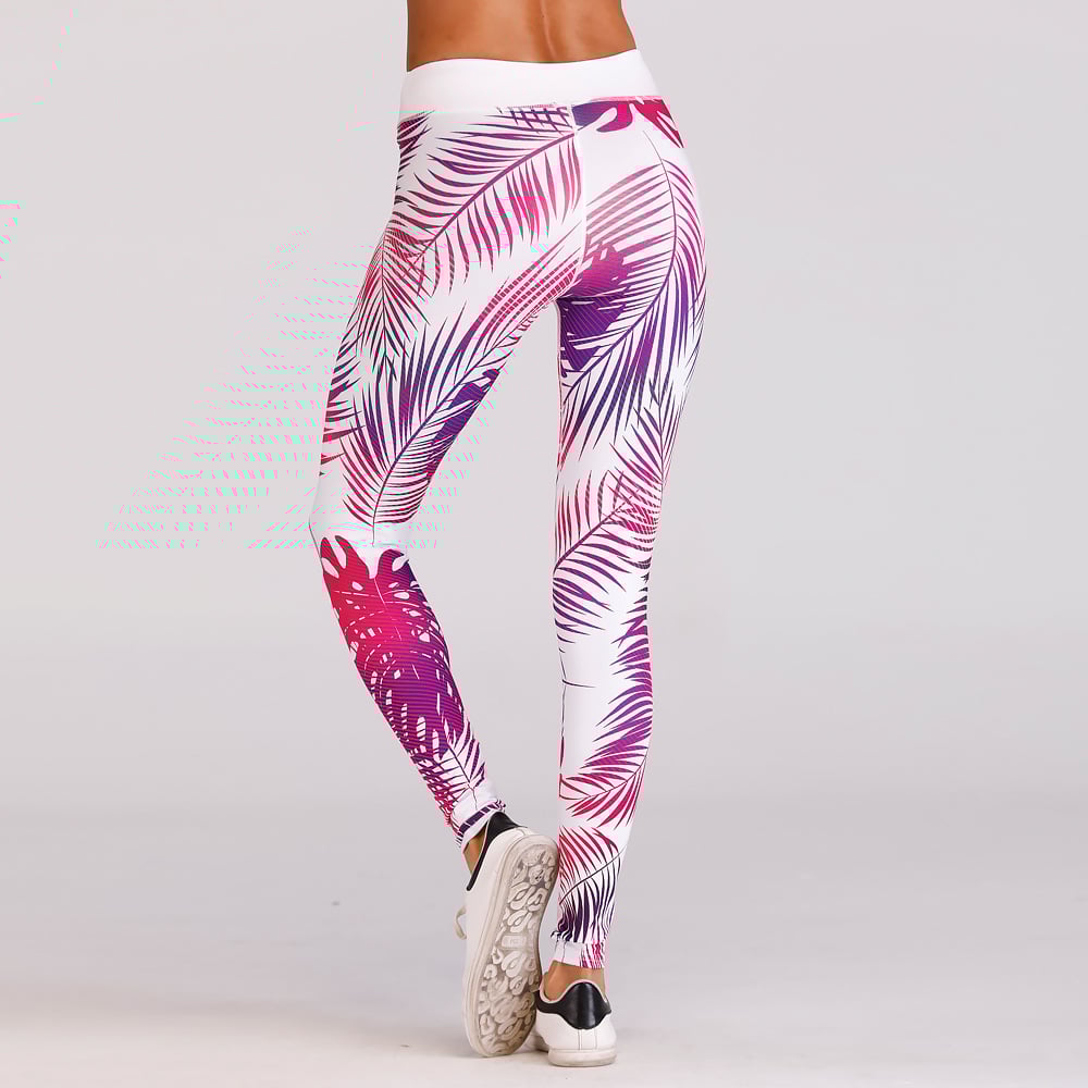 Damen-Leggings mit tropischem Blattmuster in Rosa und Lila, ideal für Yoga und Fitness. Bequeme Sporthose mit modernem Design.