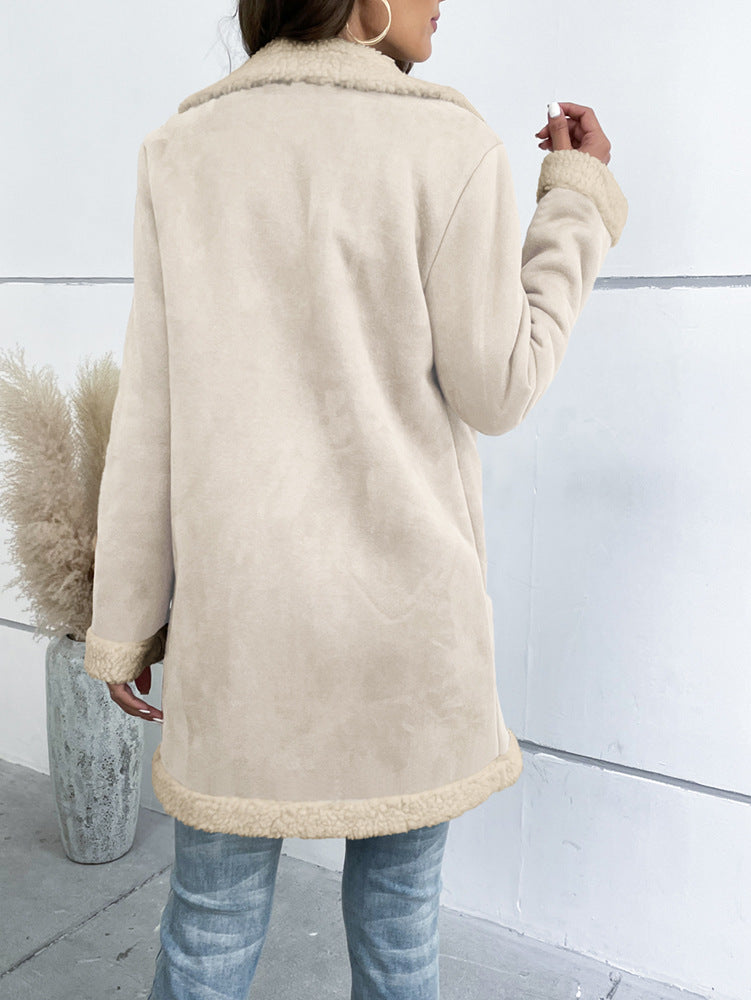 Women's long winter coat with lapel collar and solid suede look
