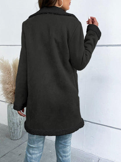 Women's long winter coat with lapel collar and solid suede look
