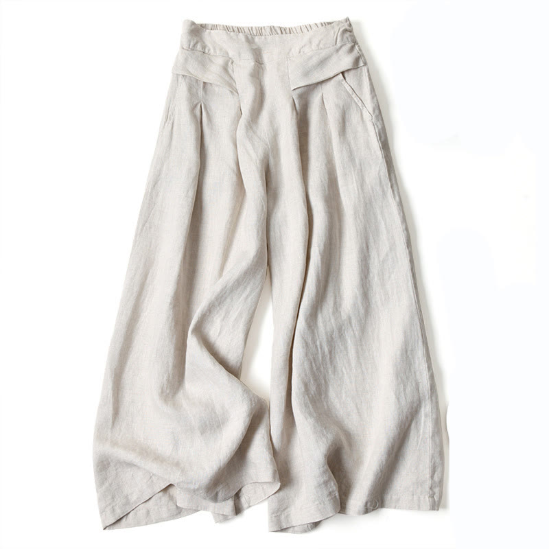 Weite Leinenhose Damen, beige, mit hoher Taille und weitem Bein. Sommermode, lässiger Stil, atmungsaktiver Stoff, ideal für warme Tage.