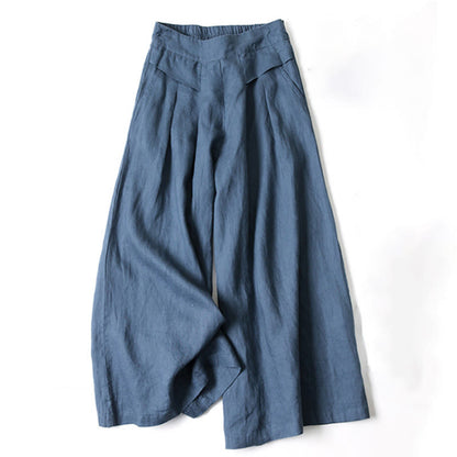 Weite blaue Leinenhose für Damen, modisch und bequem, ideal für Sommermode. Hochwertige Stoffhose mit weitem Bein und elastischem Bund.