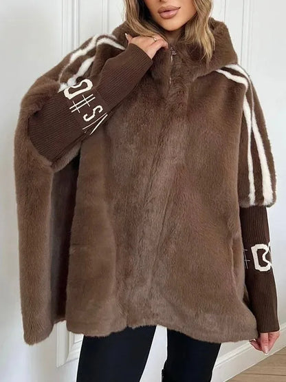 Women's winter coat made of faux fur with hood and contrasting sleeves