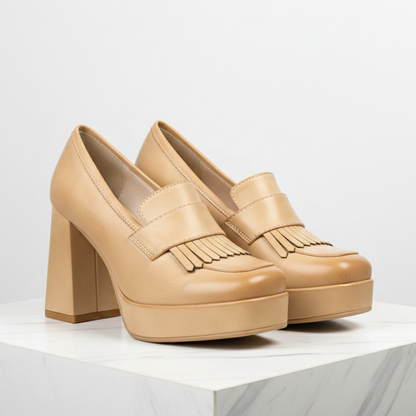 Women's platform shoes in loafer style slip-ons with block heel and front platform