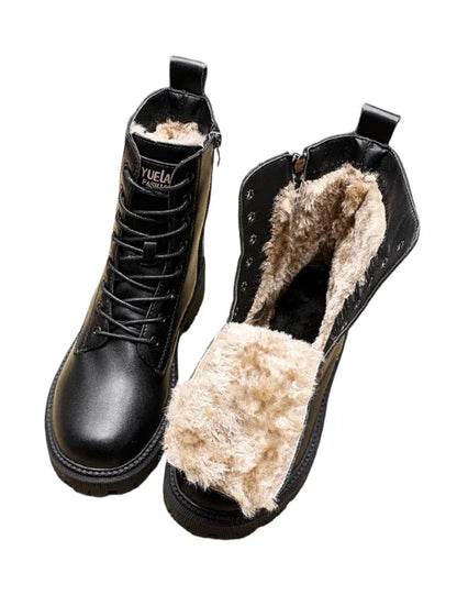 Schwarze Winterstiefel mit Kunstfellfutter, Reißverschluss und Schnürung. Ideal für kaltes Wetter, modisch und warm. Perfekt für Damen.