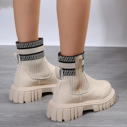 Women's winter boots with mid-calf shaft and side zipper