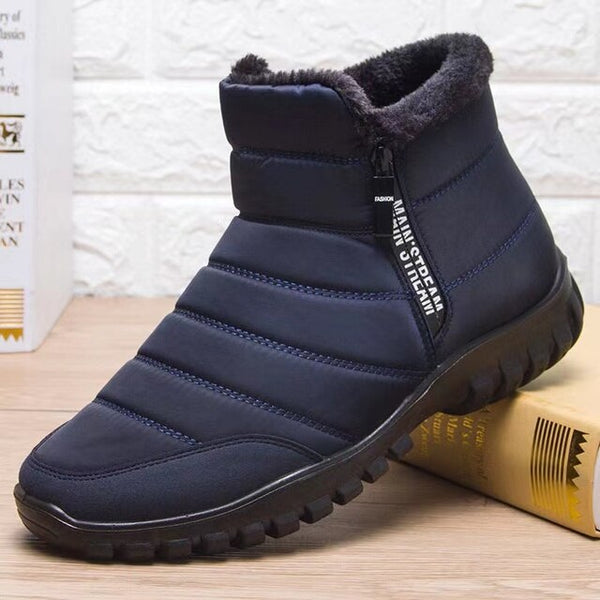 Dunkelblauer Winterstiefel mit Reißverschluss, warm gefüttert, rutschfeste Sohle, ideal für kaltes Wetter. Perfekt für Herrenmode und Outdoor-Aktivitäten.