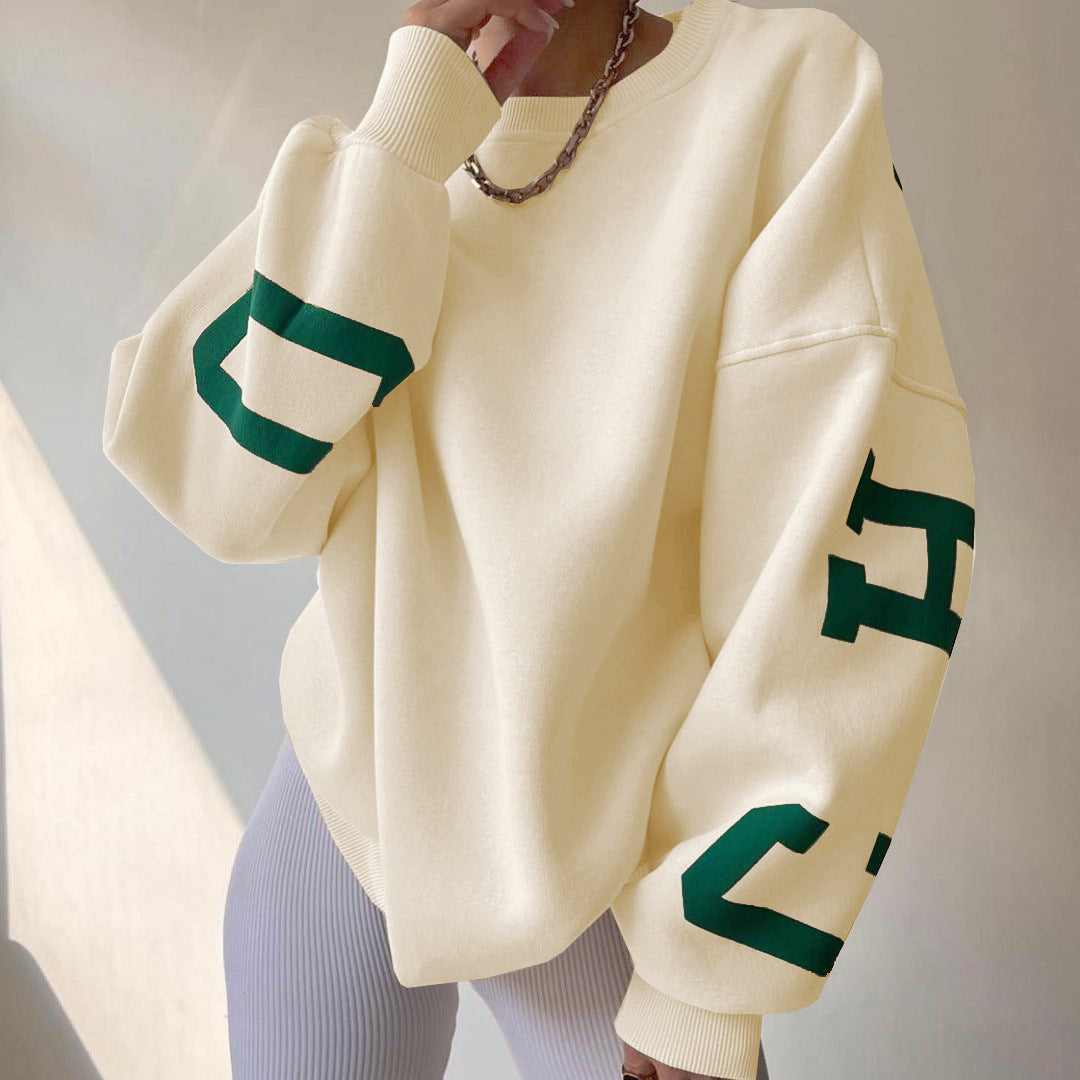 Women's top with print, round neckline, and long sleeves, loose fit