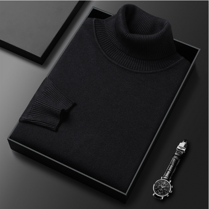 Schwarzer Rollkragenpullover in Geschenkbox, elegant gefaltet, neben einer stilvollen Armbanduhr auf schwarzem Hintergrund. Luxuriöse Herrenmode.