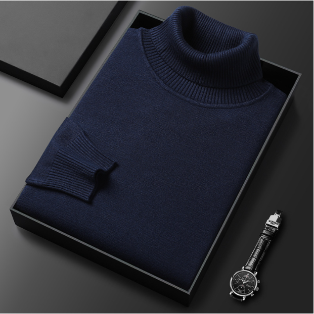 Dunkelblauer Rollkragenpullover in Geschenkbox auf schwarzem Hintergrund, neben einer eleganten Armbanduhr. Hochwertige Modeaccessoires.