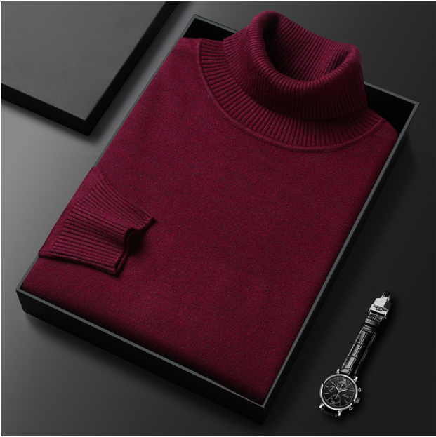 Bordeauxroter Rollkragenpullover in Geschenkbox, daneben eine elegante Armbanduhr. Hochwertige Mode, stilvolles Design, perfekte Geschenkidee.
