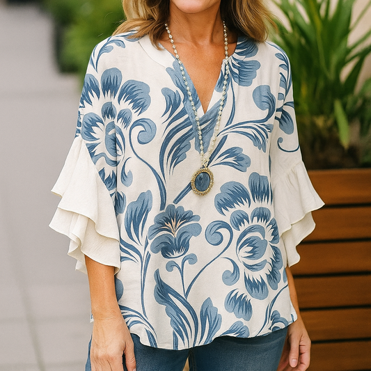 Women's Spring Blouse with Loose Fit, V-Neck, and Batwing Sleeves with Flower Pattern