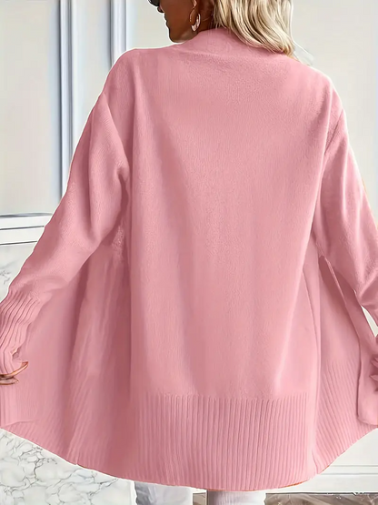 Damenmode: Rosa Strickjacke, lässig geschnitten, aus weichem Material. Perfekt für Herbstmode und stilvolle Outfits. Elegante Damenbekleidung.