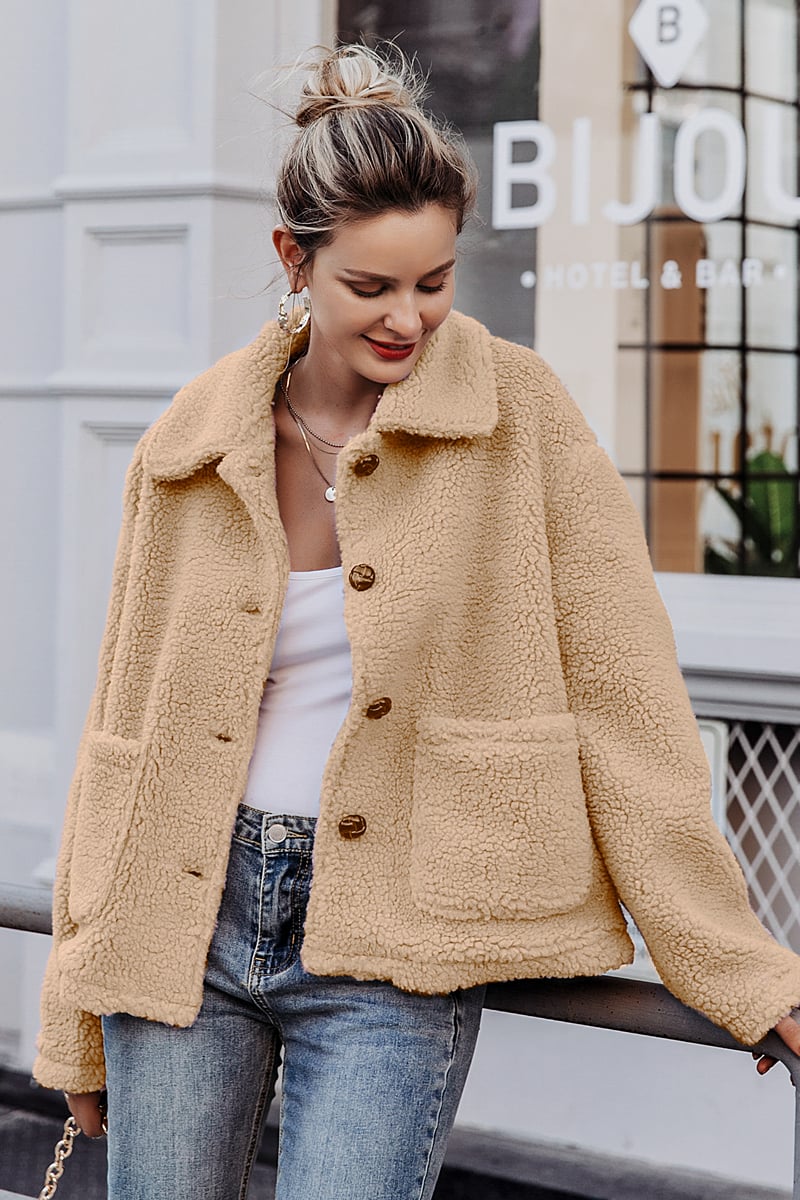 Women's winter coat with long sleeves and open front – faux fur style