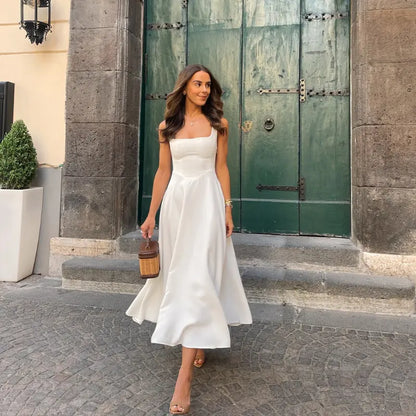 Women's mid-length dress with square neckline, V-shaped waist, and built-in cups
