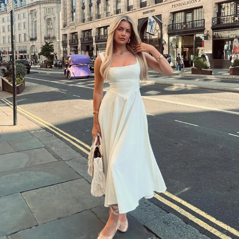 Women's mid-length dress with square neckline, V-shaped waist, and built-in cups