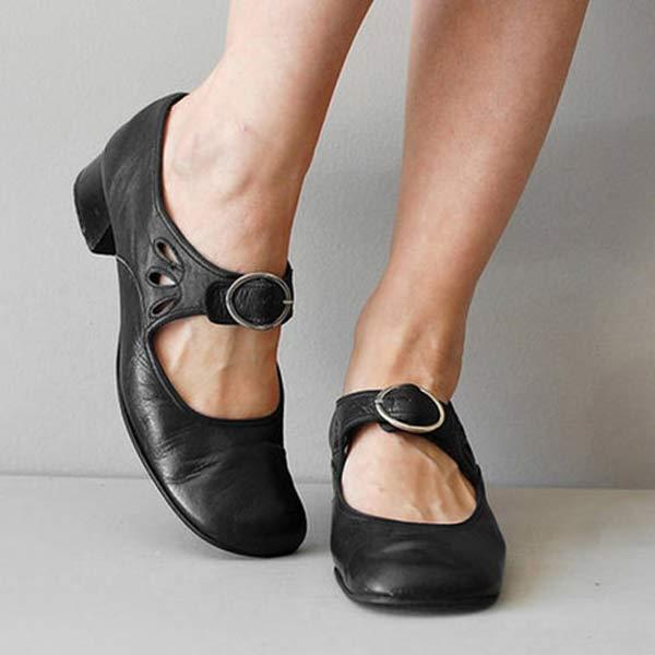 Schwarze Mary Jane Schuhe mit Schnalle, niedriger Absatz, elegantes Design. Perfekt für Damenmode, bequem und stilvoll für den Alltag.