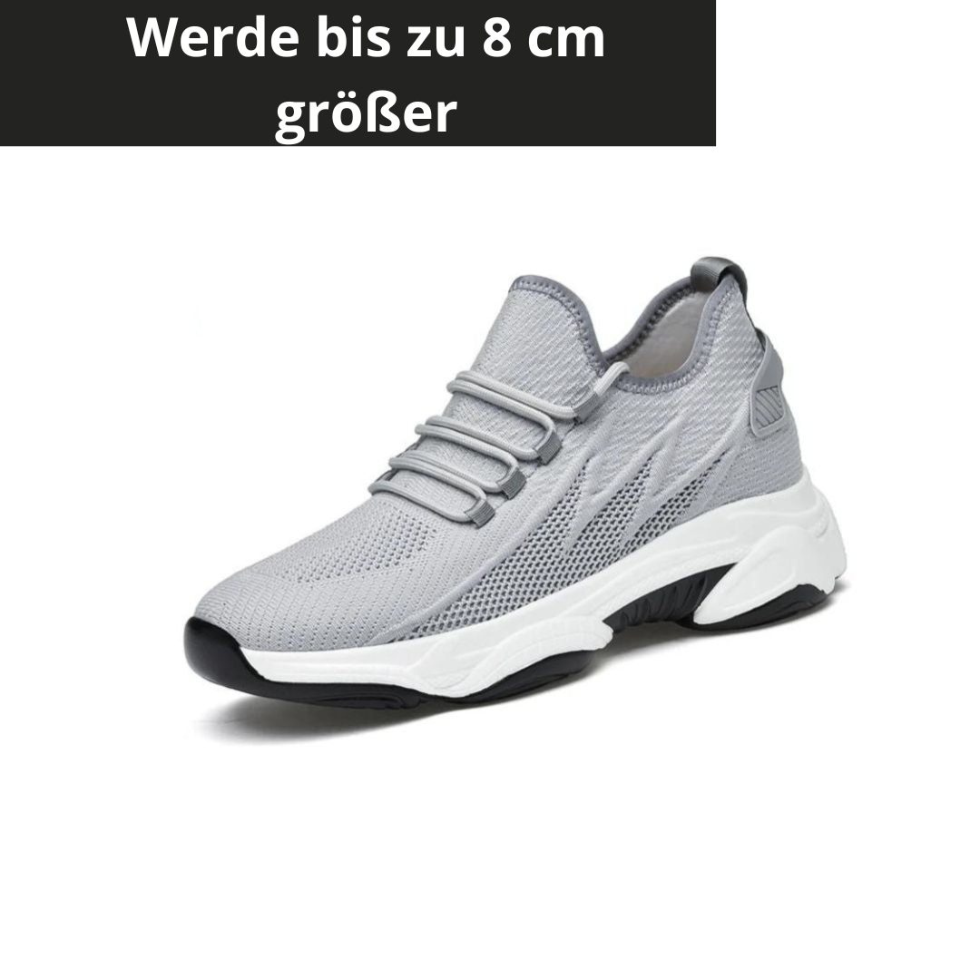 Grauer Sneaker mit dicker Sohle, atmungsaktivem Mesh-Obermaterial und elastischen Schnürsenkeln. Erhöht die Körpergröße um bis zu 8 cm.
