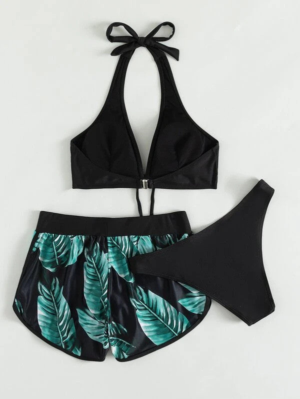 Schwarzer Bikini mit tropischem Blattmuster auf Shorts, Damen-Badeanzug, modisch, Sommer, Strandmode, zweiteiliges Set, Halterneck-Oberteil.