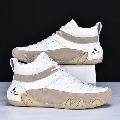 Weiße und beige High-Top-Sneaker mit markantem Sohlenprofil, Salkin-Logo, sportlich-modernem Design, ideal für Freizeit und Streetwear.