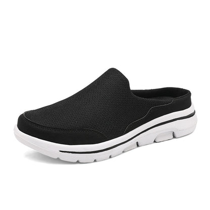 Schwarzer Herren-Slipper mit weißer Sohle, atmungsaktives Mesh-Obermaterial, bequeme Freizeitschuhe, ideal für Sommer und Alltag.
