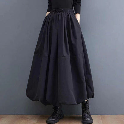 Women's solid color A-line skirt with layered design