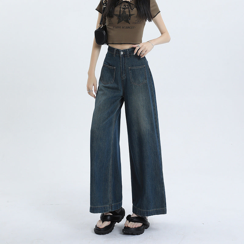 Women's high-waisted retro pants with wide, straight legs in denim mix