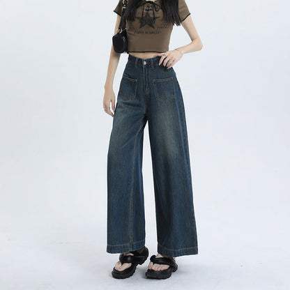 Women's high-waisted retro pants with wide, straight legs in denim mix