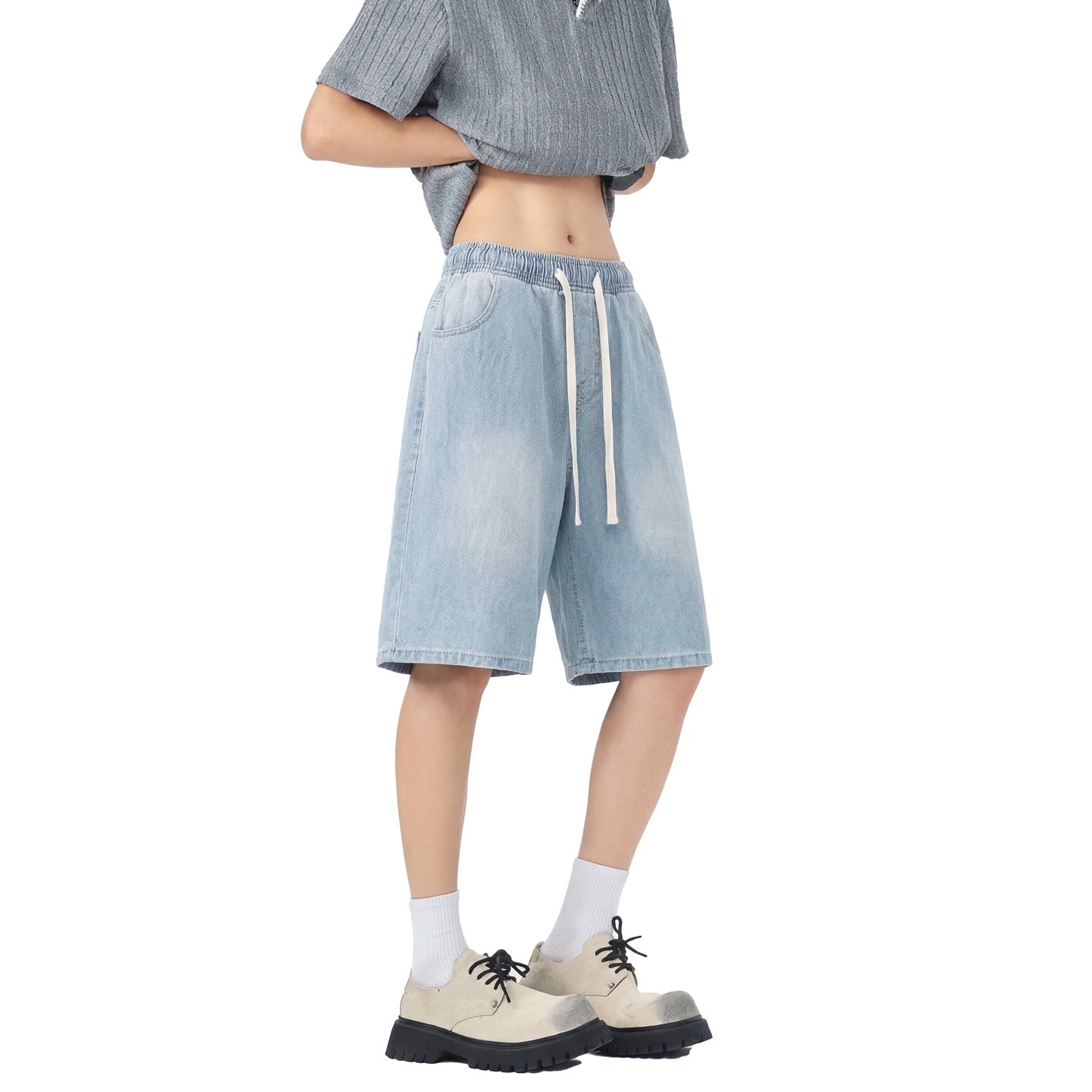 Men's denim shorts with stretch waistband, straight leg, and shortened fit