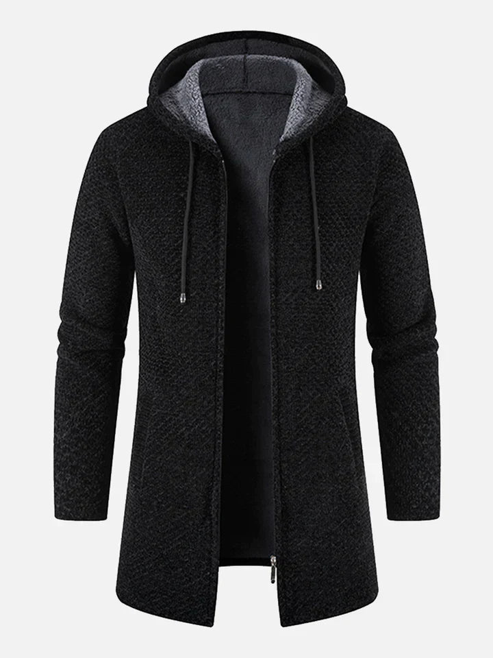 Schwarzer Herrenmantel mit Kapuze, Reißverschluss und Kordelzug. Modischer Wintermantel, warmes Fleece-Innenfutter, ideal für kalte Tage.