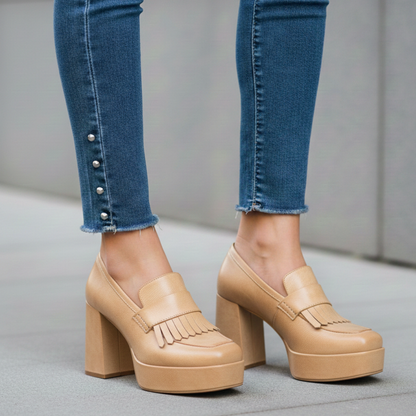 Women's platform shoes in loafer style slip-ons with block heel and front platform