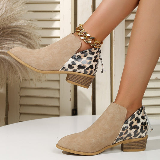 Women's ankle boots with leopard pattern, pointed toe, medium block heel, and back zipper