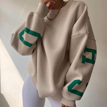 Women's top with print, round neckline, and long sleeves, loose fit