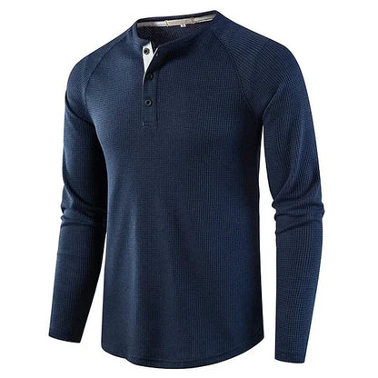 Dunkelblaues Herren-Langarmshirt mit Knopfleiste, lässiger Stil, ideal für Herbstmode. Bequemes Baumwollmaterial, perfekt für Freizeitkleidung.