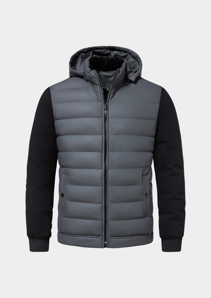 Graue Herren-Steppjacke mit Kapuze, Reißverschluss und schwarzen Ärmeln. Modische Winterjacke, warm und stilvoll für kalte Tage.