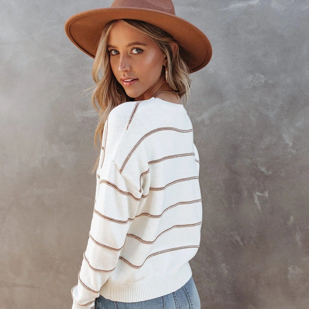 Women's sweater with stripes, round neckline, and long sleeves